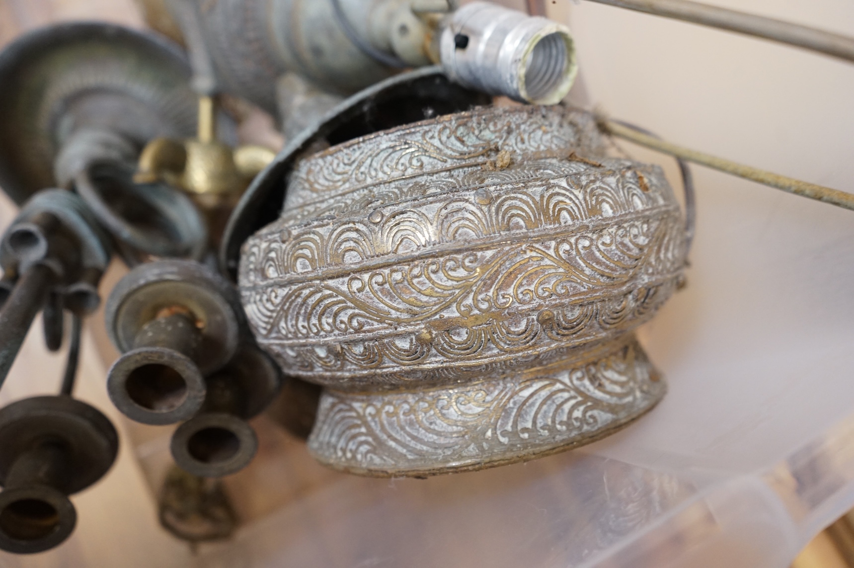 A collection mixed metal ware to include table lamps planters and a pestle and mortar